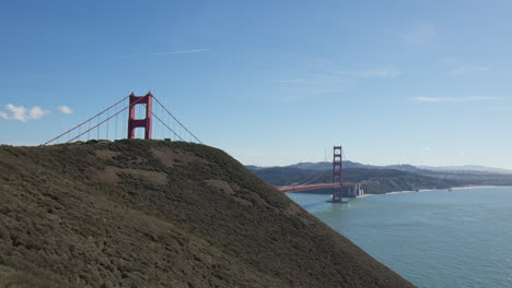 green mountains with golden gate bridge at background in san francisco, california, united states