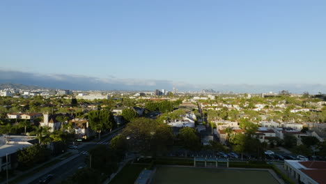 flying up revealing the beverly hills community, sunrise in los angeles, usa - aerial view