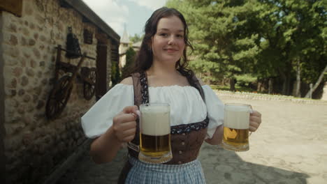 Woman in Dirndl Holding Beer Mugs