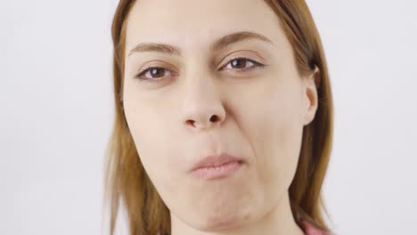 woman eating dried figs, close-up. dried fruits.