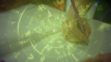 alphabets floating and spinning against close up of a student hand drawing in a book at school