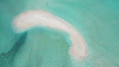 Beautiful-sandbank-in-Maldives-with-turquoise-shallow-water-of-calm-Indian-ocean-drone-shot-on-sunny-day