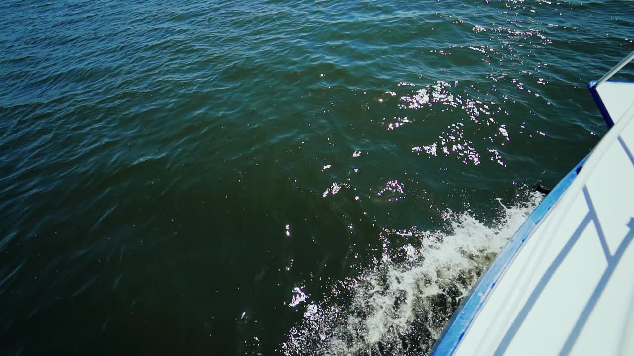 Beautiful brunette posing over beautiful romantic landscape. Traditional Venetian rowing boat
