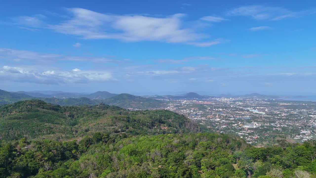 Sweeping aerial footage captures lush hills