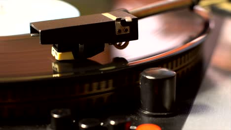 vinyl record on the pleer. plays a song from an old turntable.