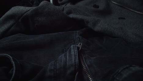 Close-Up-View-Of-Black-Denim-Pants