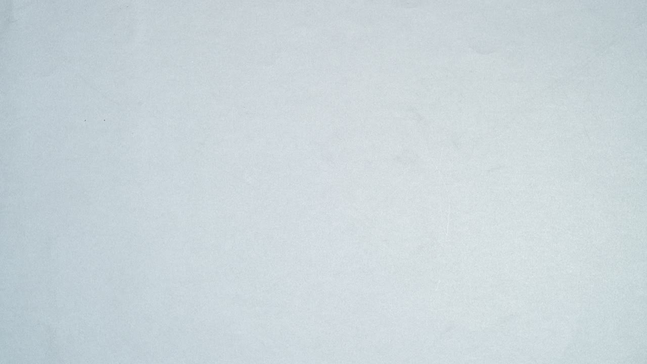 Silver gift with dark blue ribbon fast passing on different sides on silver background. Stop motion