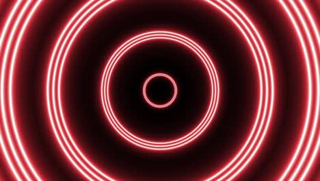 grupo de círculos rojos animación de bucle sin costuras en un fondo oscuro. vuelo futurista sin costuras abstracto en gráfico de movimiento de túnel