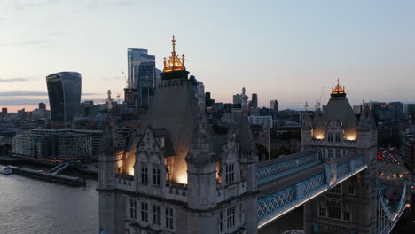 Closeup-of-top-of-Tower-Bridge.-Famous-old-bridge-over-River-Thames,-one-of-symbols-of-city.-Modern-downtown-skyscrapers-in-background.-Parallax-effect.-London,-UK