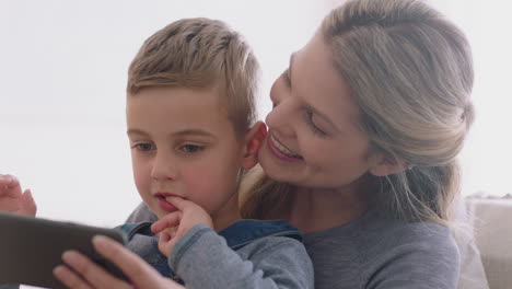 mother and child using smartphone having video chat little boy with mom waving sharing vacation weekend with son enjoying chatting on mobile phone 4k footage