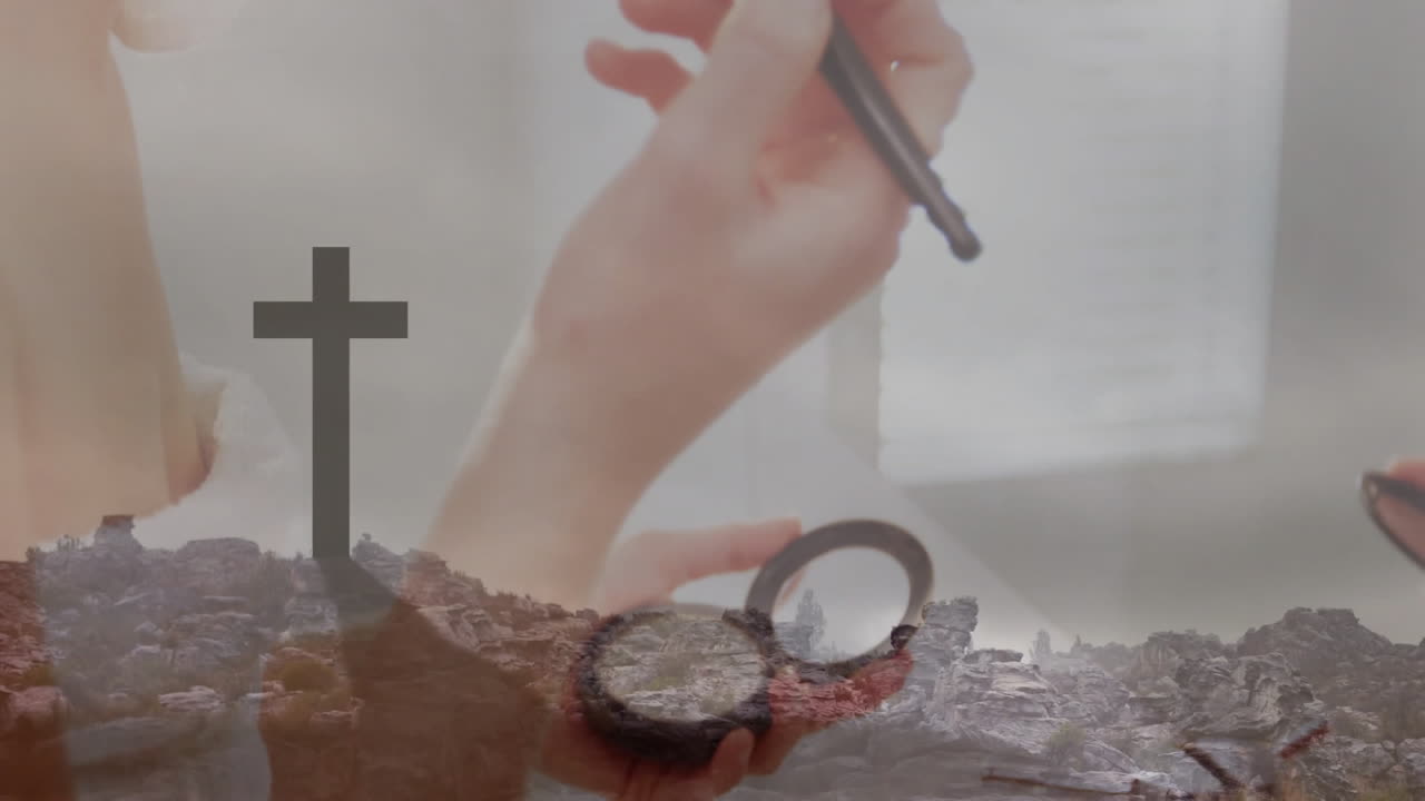 Holding glasses and pen, person sketching cross silhouette in rocky landscape