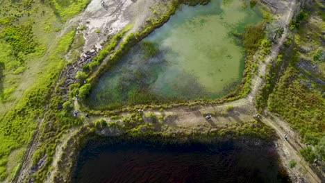 Flying-over-a-lake-with-a-Motorcycle-group