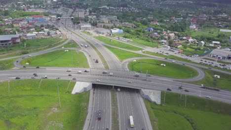 aerial view of highway interchange and cityscape