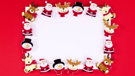 merry christmas text appear in frame with christmas stickers. stop motion