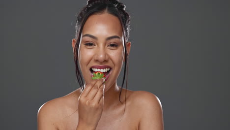 woman, strawberry and beauty in studio for health