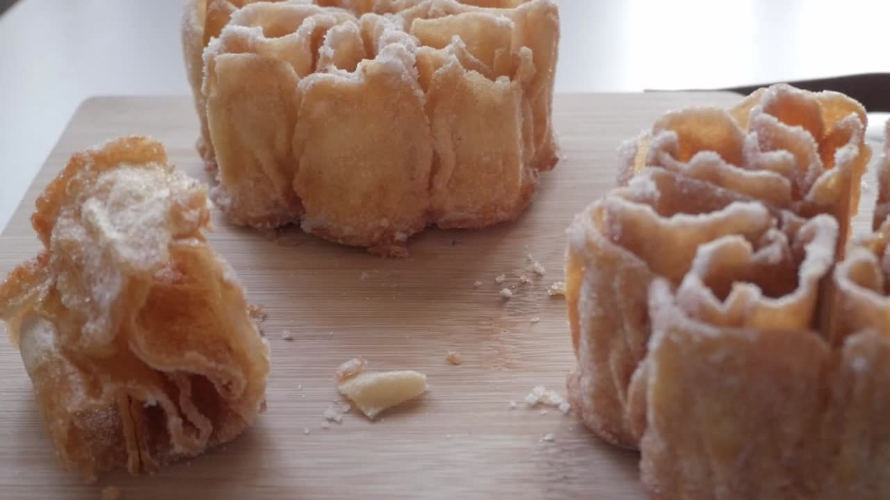 Golden Spanish flor frita, also called flor de Lis or hojuela