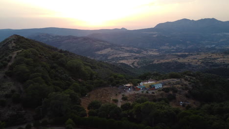 a drone aerial of a remote ranch in the pico de los reales, in estepona, spain, wilderness