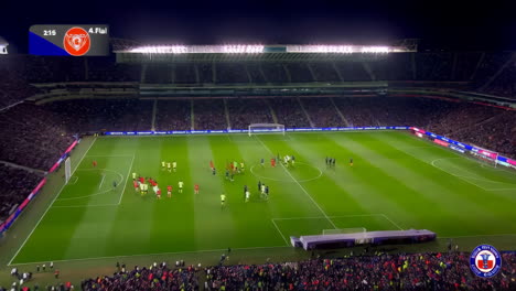 soccer match in stadium at night