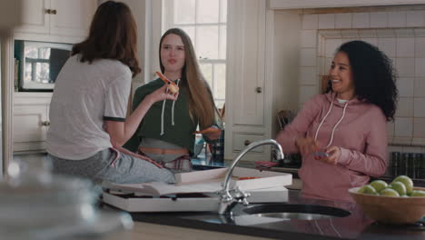 group-of-teenage-girls-eating-pizza-in-kitchen-having-fun-chatting-together-sharing-lifestyle-friends-hanging-out-enjoying-relaxing-at-home