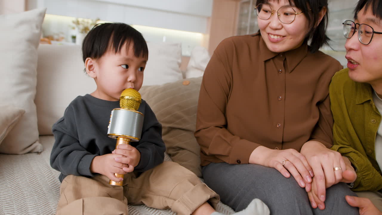 Family Singing with a Microphone