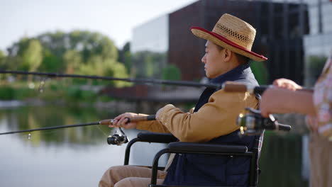 man in wheelchair fishing