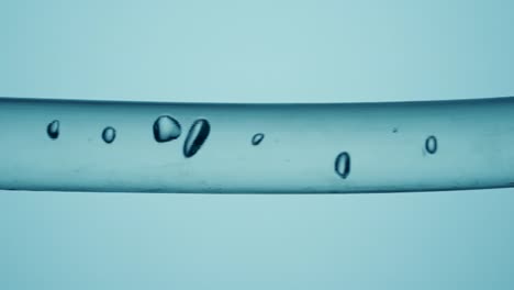 water flowing through a transparent tube