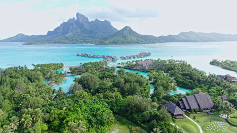 Bora Bora Island French Polynesia. Drone Shot of Luxury Resort With Villas Over Lagoon Water