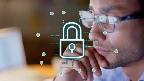 animated lock and cybersecurity icons over thoughtful person wearing glasses