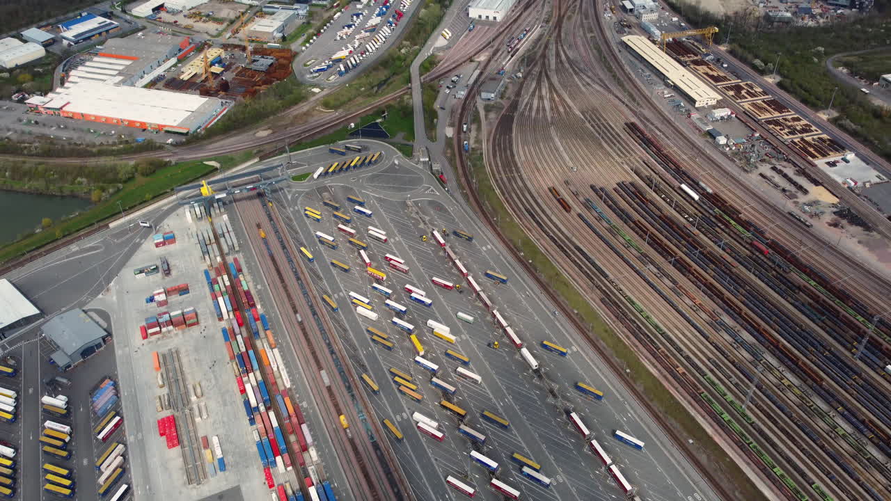 Aerial View of a Busy Container Terminal and Rail Yard
