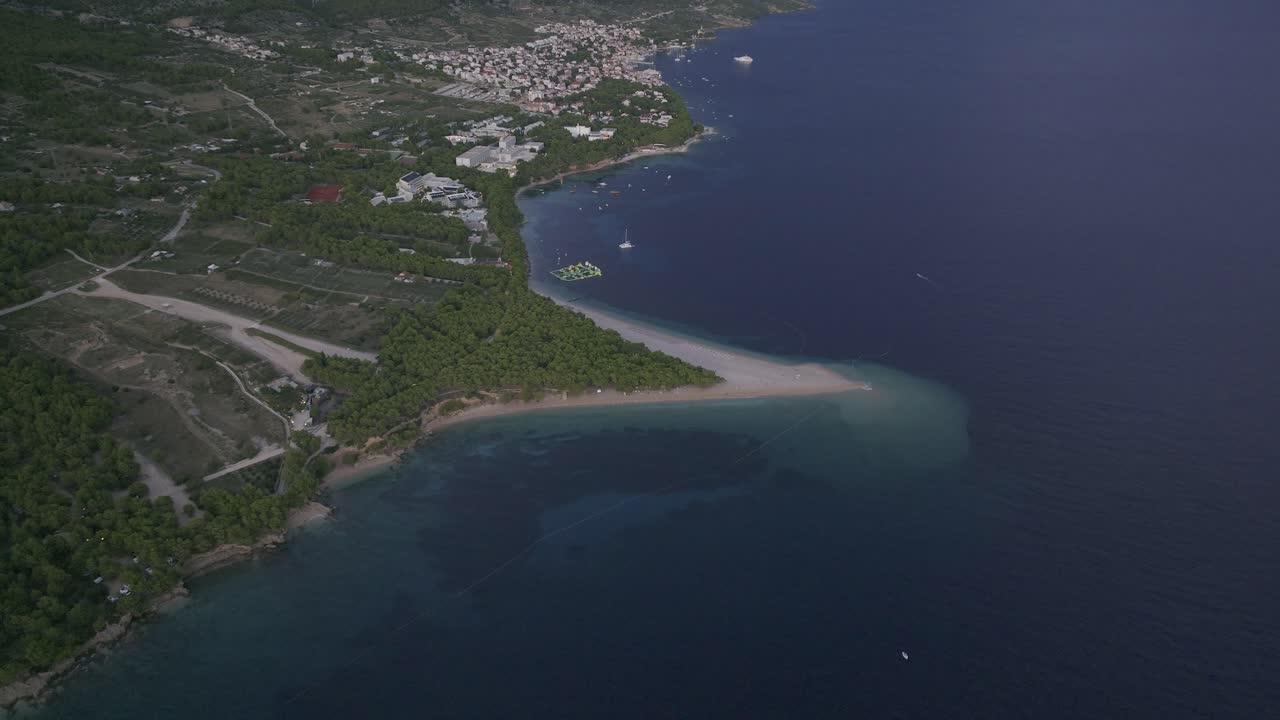 Explore the stunning Zlatni Rat Beach on Brač Island through breathtaking aerial footage.