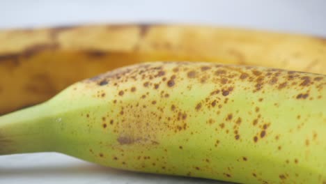 close-up of a banana with brown spots