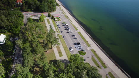 Aerial-View-Of-Arka-Gdynia-Square-And-Waterfront-Parking-Lot-In-Gdynia,-Poland