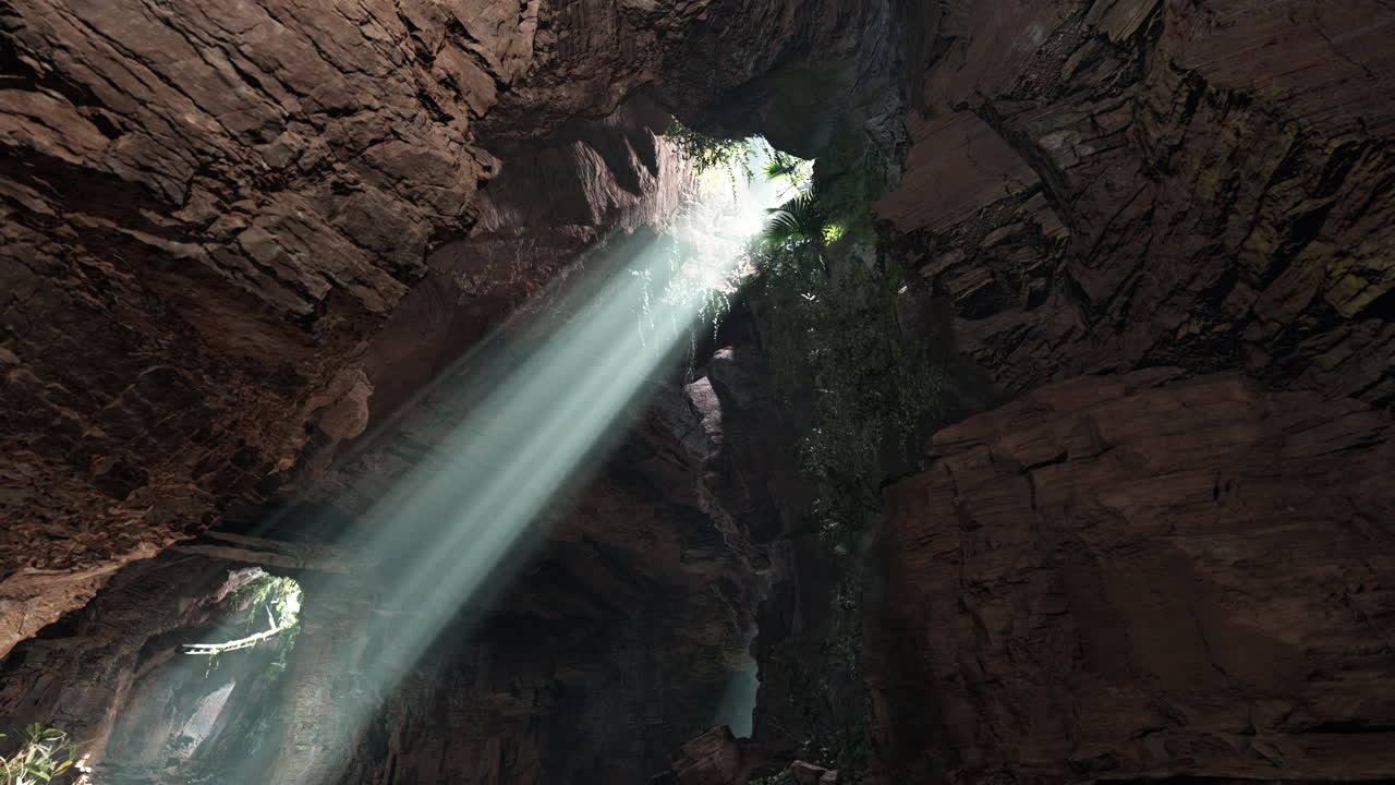 la luz del sol brillando a través de una abertura de cueva en una jungla