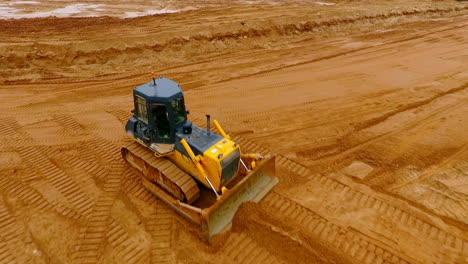 Bergbaumaschinen.-Bulldozer-Maschine.-Luftaufnahme-Des-Raupen-Bulldozer-Minensandes