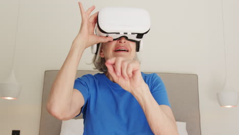 senior woman using virtual reality headset for immersive experience at home