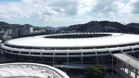 aerial clip of maracana stadium with panorama of rio de janeiro city