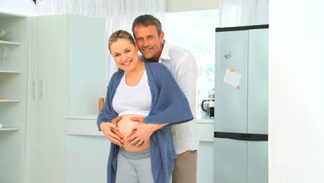 lovely future parents in the kitchen