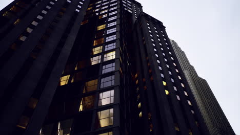city skyscrapers reflect evening light in urban atmosphere