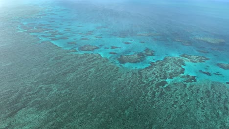 aerial 4k of great barrier reef in queensland, australia in december 2022