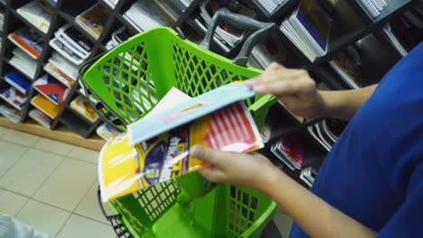 vinnitsa, ukraine - august 20, 2018: back to school concept. purchase of stationery in the store. close-up.