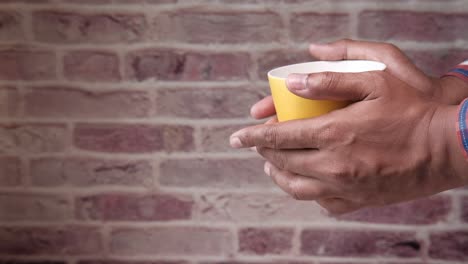 hands holding a cup - begging for help