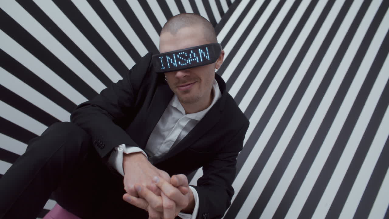 Man in futuristic LED glasses