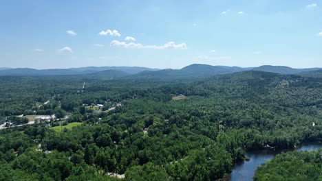 drone view of the white mountains and saco river in new england on a sunny day