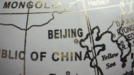 close-up of beijing, china on a globe
