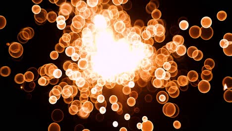 el brillo abstracto de las partículas de burbujas de bokeh de oro que vuelan sobre un fondo negro, las partículas de bokeh del oro rojo naranja y el polvo vuelan en el aire en la cámara de cámara súper lenta de 1000 fps.