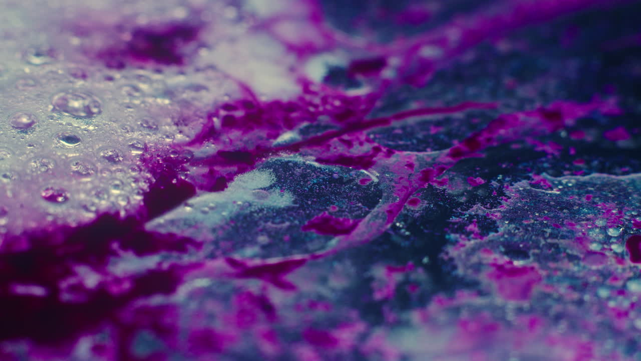 Colourful, organic, liquids macro shots buzzing and flowing