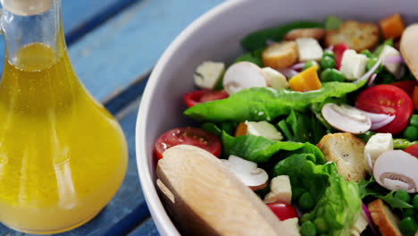 salad with oil in bowl