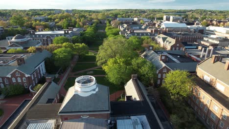 Memorial-Hall-University-of-Delaware-reverse-drone-reveal-spring-golden-hour-Newark