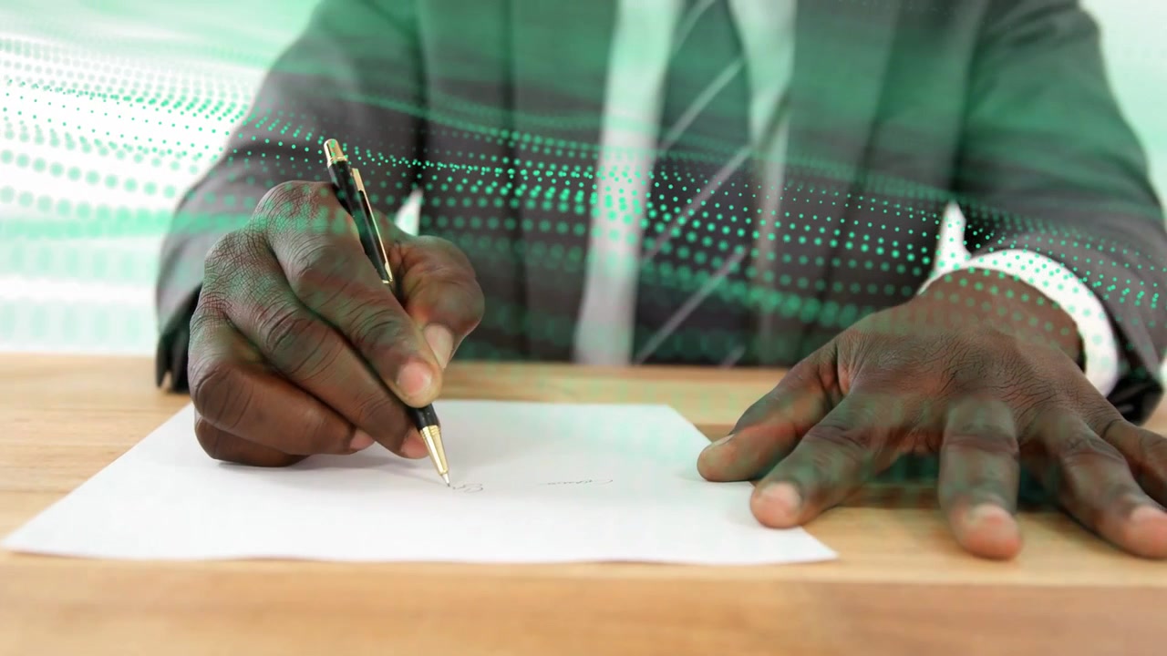 Businessman touching pen to paper, writing as dotted-wave graphic tracking strokes for signing