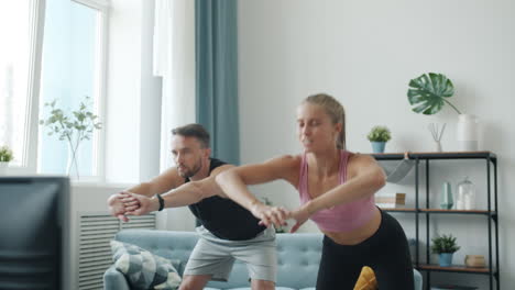 couple exercising at home